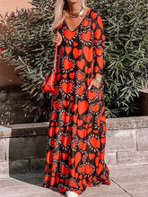 Vestido estampado de manga larga con cuello en V y bolsillos